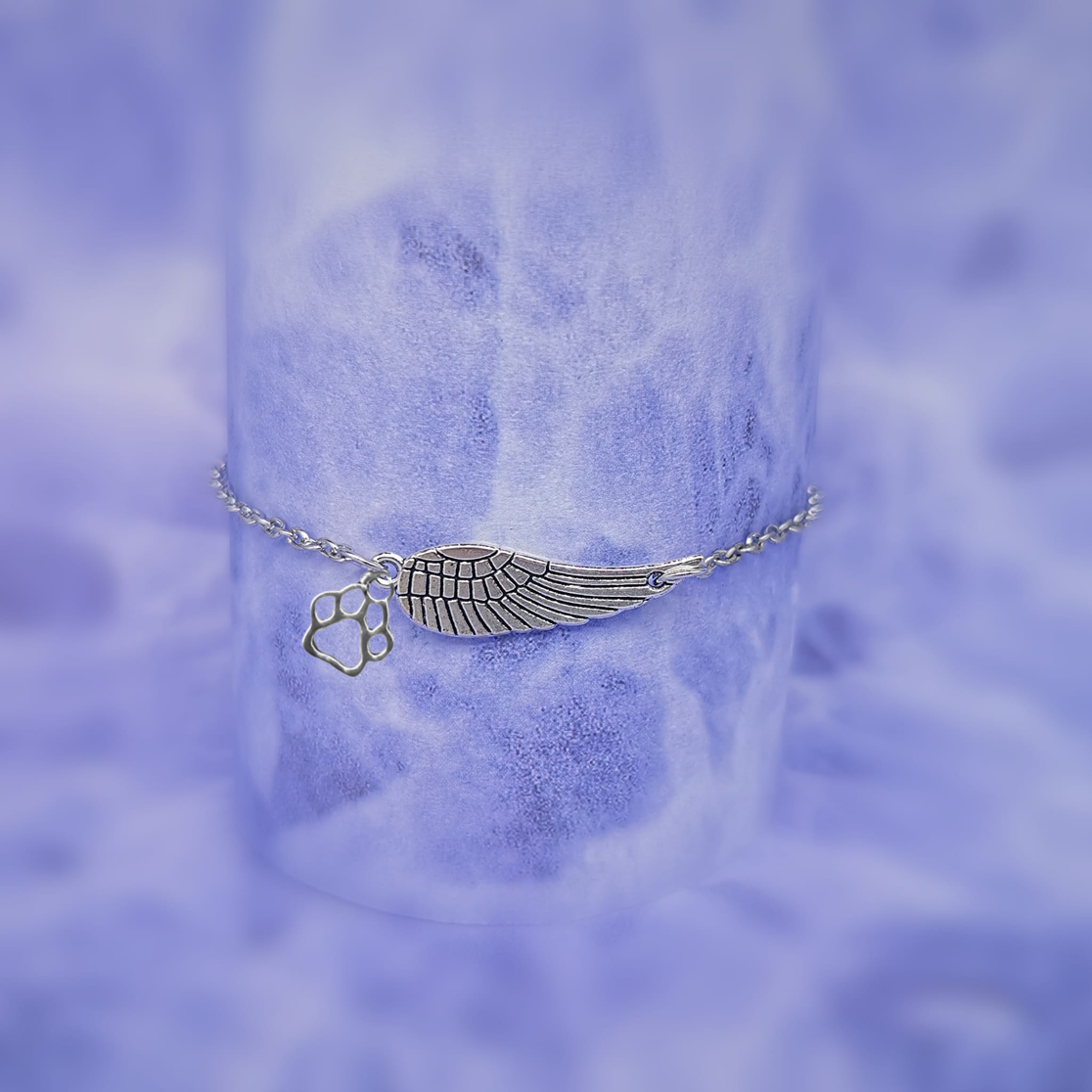 Pulsera Conmemorativa de Plata con Ala de Ángel y Huella de Pata |