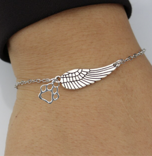 Pulsera Conmemorativa de Plata con Ala de Ángel y Huella de Pata |