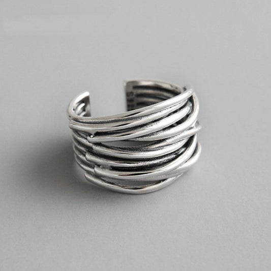 Anillo ajustable de plata con capas