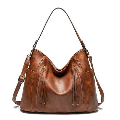 Coralie™ | Bolsa de cuero con flecos