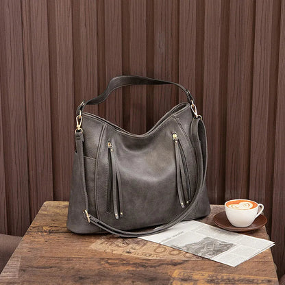 Coralie™ | Bolsa de cuero con flecos