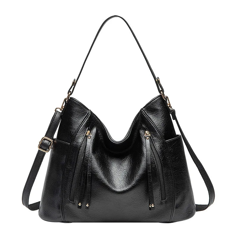 Coralie™ | Bolsa de cuero con flecos