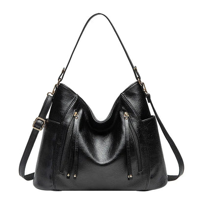 Coralie™ | Bolsa de cuero con flecos