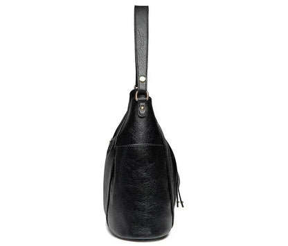 Coralie™ | Bolsa de cuero con flecos