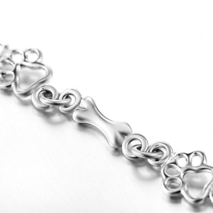 Pulsera de Brazaletes de Pata de Perro y Hueso en Plata Pura