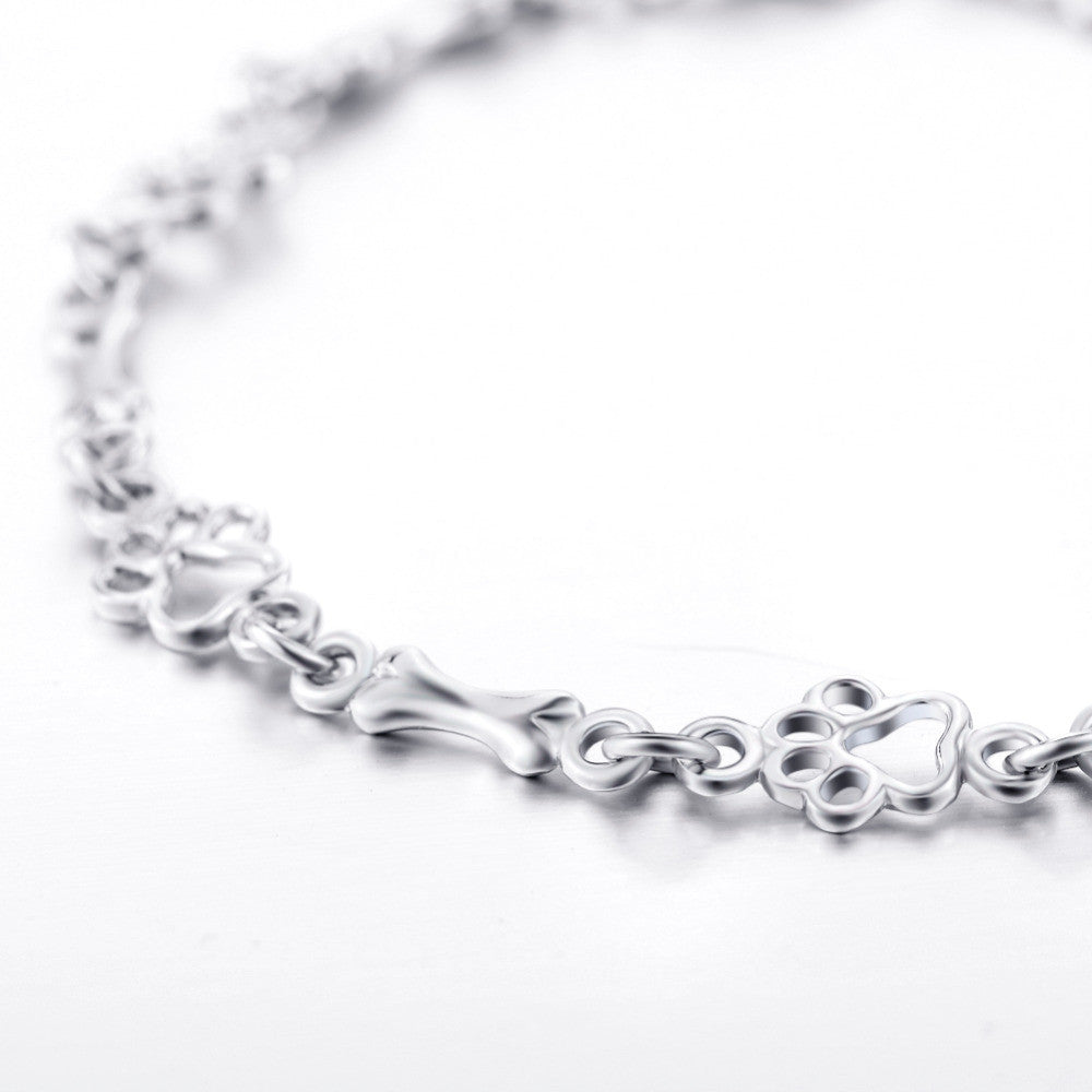 Pulsera de Brazaletes de Pata de Perro y Hueso en Plata Pura