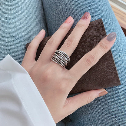 Anillo ajustable de plata con capas