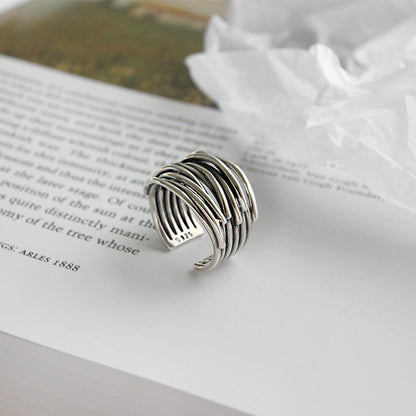 Anillo ajustable de plata con capas