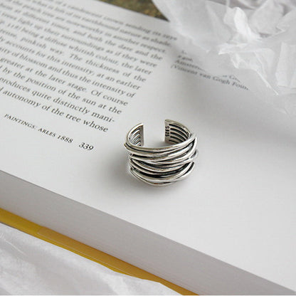 Anillo ajustable de plata con capas