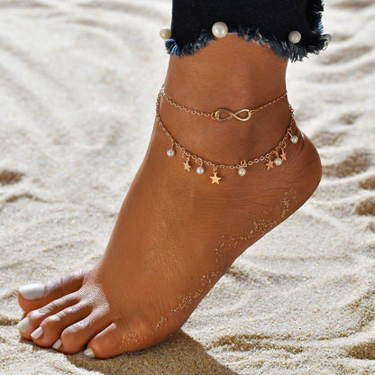 Pulsera infinita + perlas y estrellas
